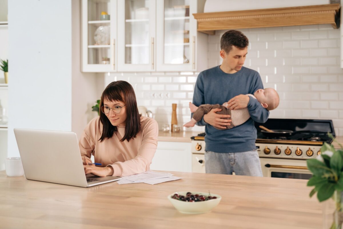 Young family in the kitchen, change gender family roles concept